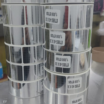 Etiqueta de seguridad metalizada rombo con rastro al despegue 40X30 ROLLO 1000PZS